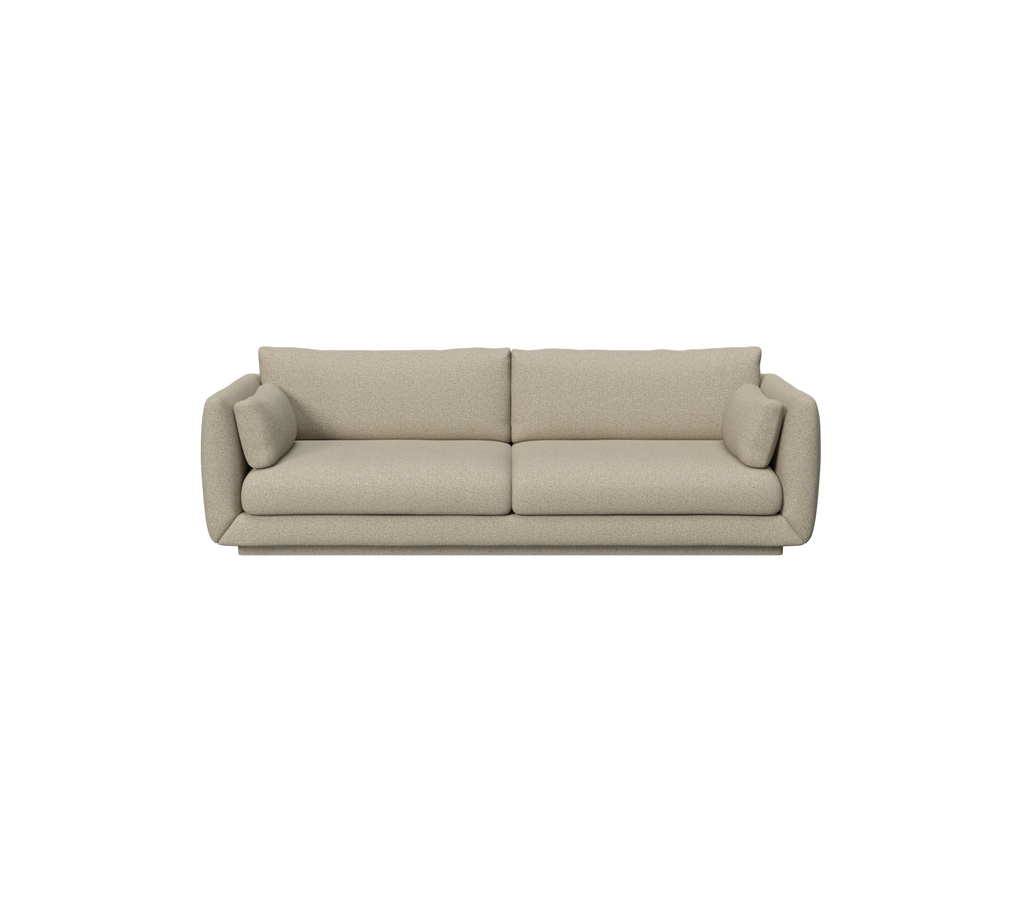 Braune moderne Sofa mit weichen Kissen in einer Lounge-Atmosphäre.