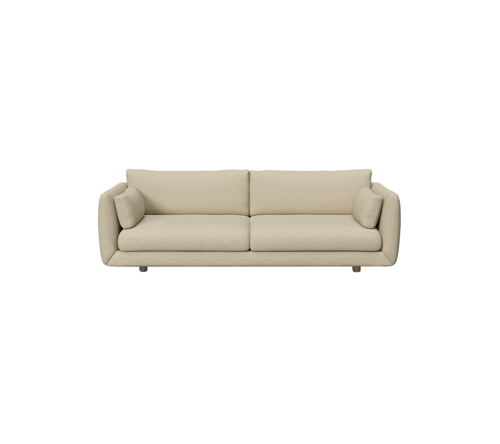 Hellbraunes modernes Sofa mit runden Kissen.