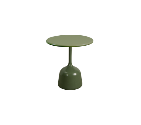 Kleiner runder Tisch mit einem schlichten Design und einer soliden grünen Oberfläche, mit einer glatten Tischplatte, die von einem runden Fuß gestützt wird.