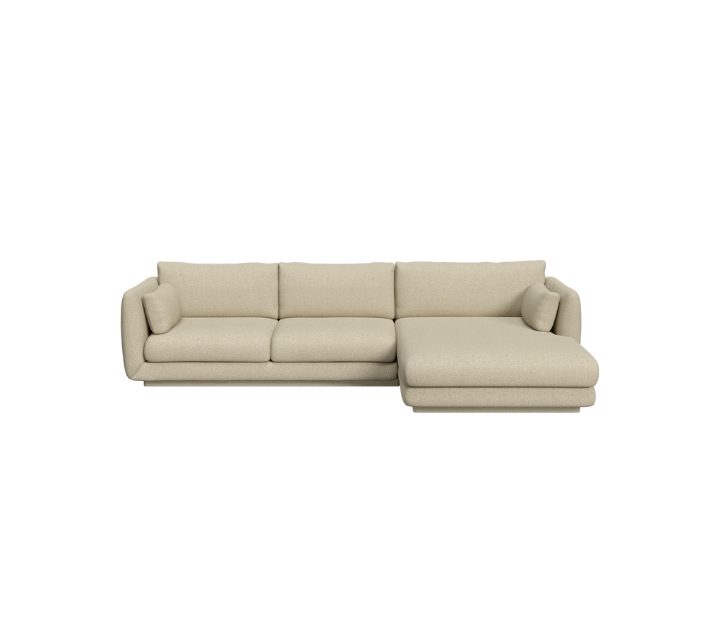 Helle braune Ecksofa in einem modernen Lounge-Bereich.