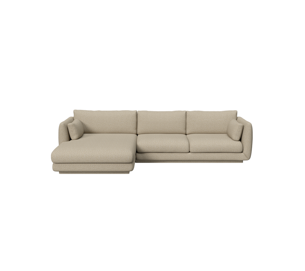 Braune moderne Sofa mit einem Chaiselong ueber die man sich entspannt setzen kann.