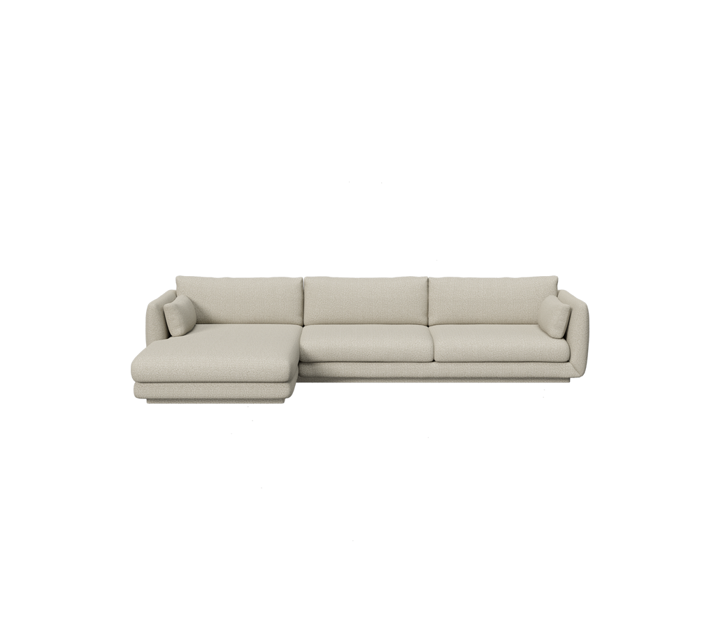 Hellbraunes Ecksofa in einem modernen Lounge-Setting.